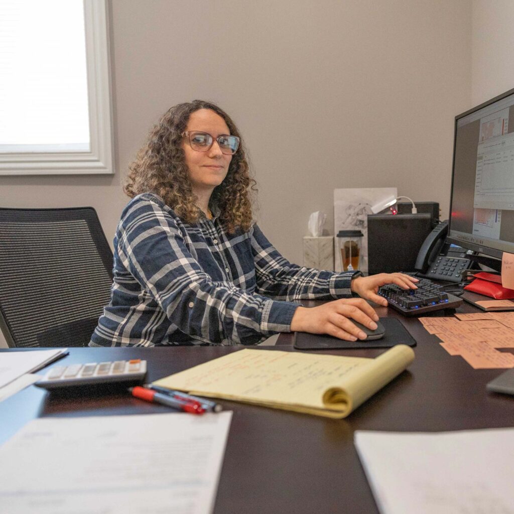 Estimator-at-gmp-contracting-hard-at-work-behind-desk